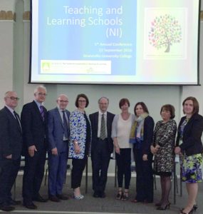 Guest of honour Mr Peter Weir (centre) pictured with the Teaching and Learning Schools (NI) Steering Group members, from the left: Paul Bell; Peter Campbell; Paul McClenaghan, Chairman TLS(NI); Victoria Hutchinson; Claire Howe; Mary McHenry; Carmel McCartan and Amanda McNamee.